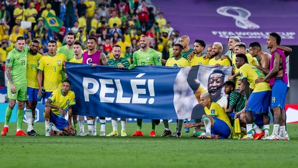Brazil's players display a banner saluting Pele during the recent World Cup in Qatar