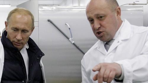 Yevgeny Prigozhin (R) shows then Russian prime minister Vladimir Putin his school lunch factory outside Saint Petersburg in 2010