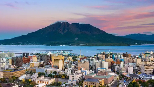 Kagoshima, Japan city skyline with Sakurajima Volcano, Kyushu (Alamy/PA)