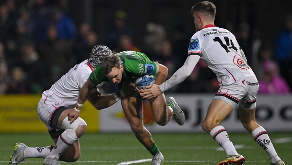 John Porch of Connacht in action against Luke Marshall, left, and Ethan McIlroy