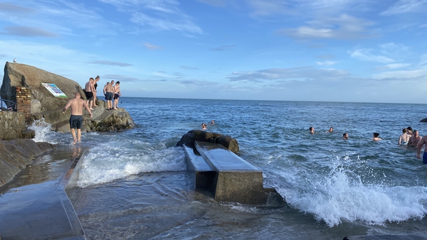 Hundreds of people turned out at the Forty Foot and Sandycove in south Dublin for their Christmas swim
