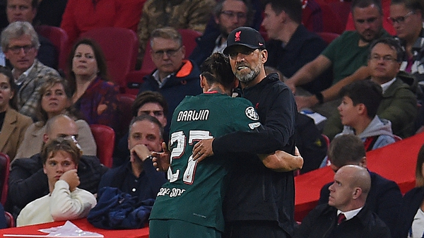 The Liverpool boss shows his appreciation for the Uruguayan striker at Villa Park