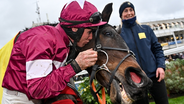Jack Kennedy celebrates with Conflated after winning the Savills Chasr