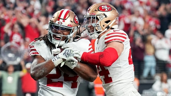 Jordan Mason(L) of the San Francisco 49ers celebrates with Kyle Juszczyk during their win in Vegas
