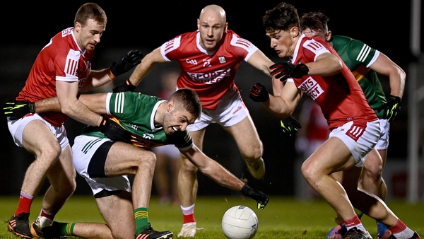 Kerry's Adrian Spillane in action against Mattie Taylor, left, and Colm O'Callaghan of Cork, right