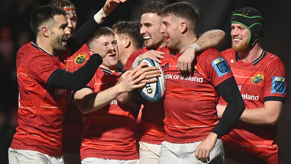 Liam Coombes celebrates scoring Munster's fourth try of the night