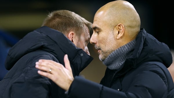 Chelsea manager Graham Potter (L) with Pep Guardiola