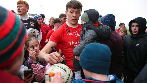 David Clifford signing autographs after the Munster club final