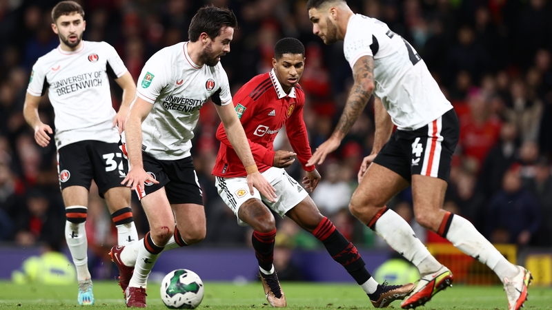 Marcus Rashford of Manchester United is challenged by Eoghan O'Connell