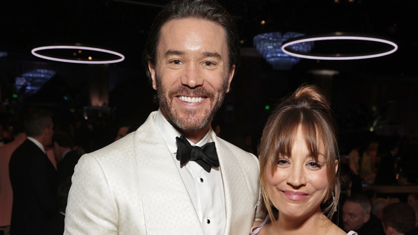 Tom Pelphrey and Kaley Cuoco attend the 80th Annual Golden Globe Awards