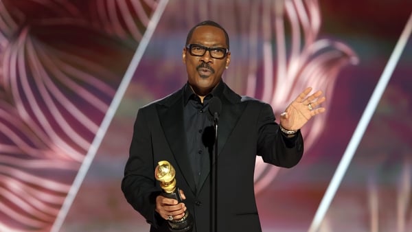 Honoree Eddie Murphy accepts the Cecil B. DeMille Award onstage at the 80th Annual Golden Globe Awards