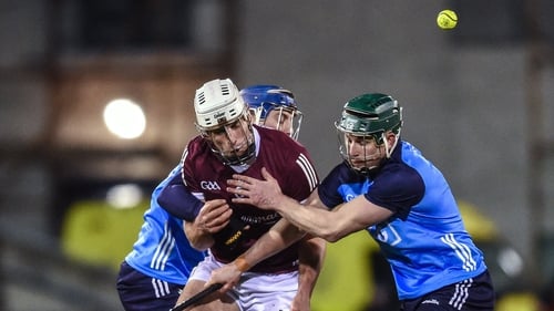 Gearóid McInerney of Galway in action against Dublin's Paul Crummey, left, and James Madden