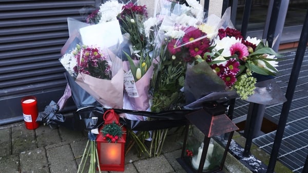 Flowers are left outside the apartment block in Ashtown in Dublin 15