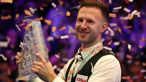 Judd Trump celebrates with the Paul Hunter Trophy
