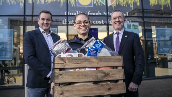 Lidl Ireland and Northern Ireland CEO JP Scally (left) with Lidl worker Patrycja Samojiuk (middle) and Bord Bia CEO Jim O'Toole (right)