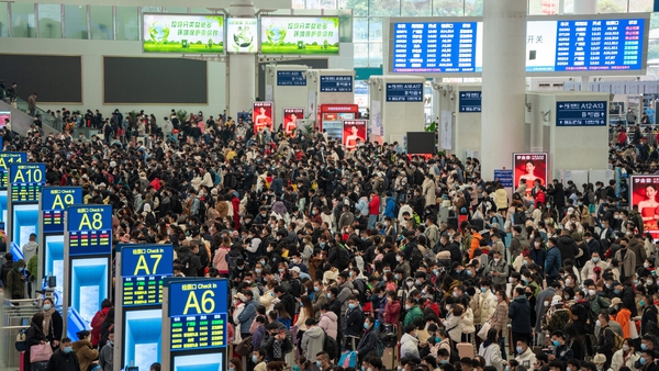 Passengers queue for trains at Shenzhen North Railway Station