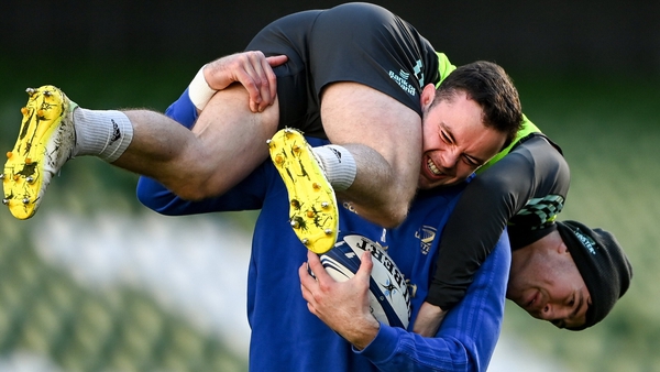 James Ryan gives Luke McGrath a lift during Friday's captain's run at the Aviva Stadium
