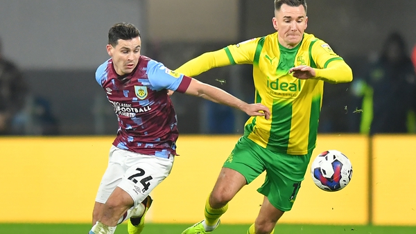 Burnley's Josh Cullen battles with West Bromwich Albion's Jed Wallace