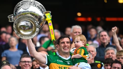 David Moran and his son Eli after Kerry's 2022 All-Ireland win