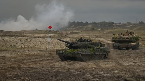 German Leopard tanks at training grounds in Nowa Deba, Poland in September 2022 during the BEAR 22 military exercise with soldiers from Poland, the US and the UK. Photo: Artur Widak/NurPhoto via Getty Images