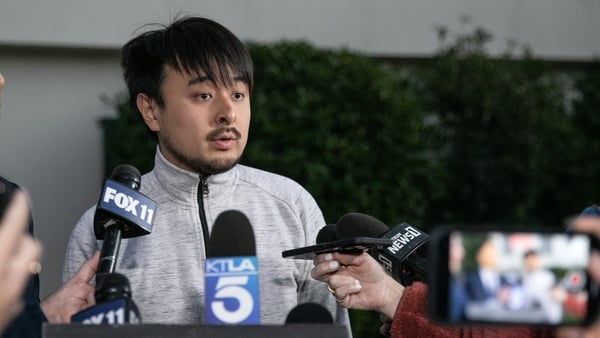 Brandon Tsay said he struggled with the gunman before wrestling the weapon away