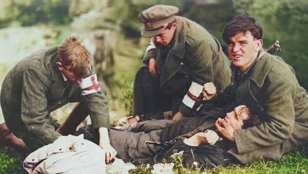An injured soldier being helped by the Red Cross on the South Western Front during the Irish Civil War (Pic: NLI, colourised by John Breslin for his book Old Ireland in Colour)