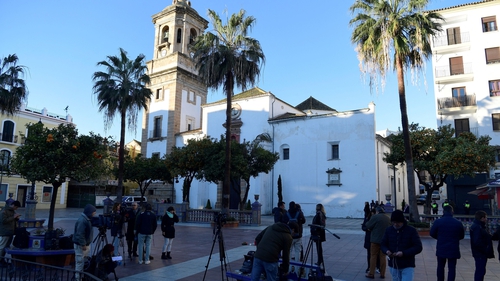 Journalists stand on the square in front of one of the churches in Algeciras today