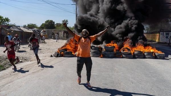 Roads around Port-au-Prince and in several cities to the north are blocked by protesters