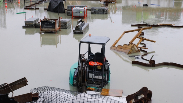 A digger is submerged in a flooded construction site at the Wynyard Quarter in Auckland