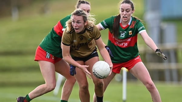 Kerry's Niamh Carmody in action against Lucy Wallace (left) and Maria Cannon of Mayo
