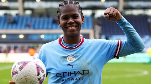 Manchester City's Khadija Shaw celebrates with the match ball after scoring a hat-trick against Sheffield United