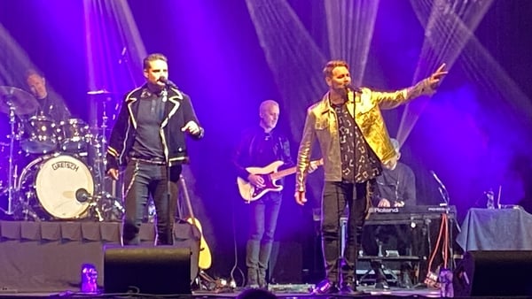 Keith Duffy and Brian McFadden performing at the concert