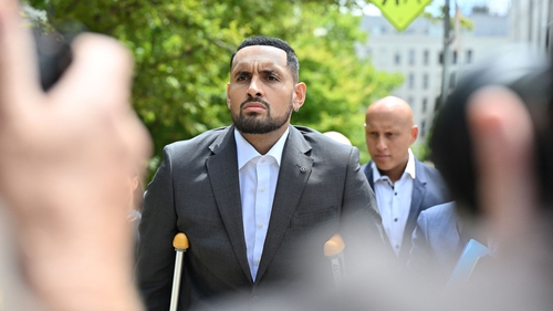 Nick Kyrgios arrives on crutches to the magistrate's court in Canberra