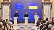 Volodymyr Zelensky (C), Charles Michel (L) and Ursula von der Leyen (R) give a joint press conference during an EU-Ukraine summit in Kyiv