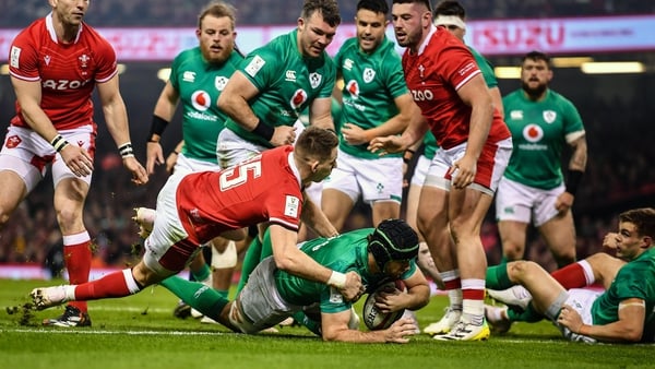 Caelan Doris dives over to score Ireland's opening try after just two minutes