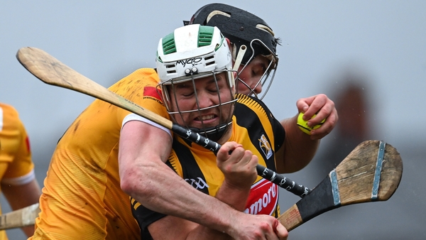 Kilkenny's Padraig Walsh is tackled by Gerard Walsh of Antrim