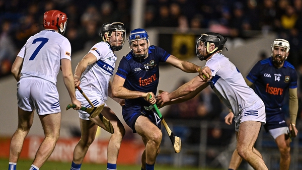 John McGrath of Tipperary in action against, from left, Fiachra C Fennell, Donnchadh Hartnett and Padraic Dunne of Laois