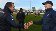 Davy Fitzgerald shakes hands with Dublin manager Micheál Donoghue after the final whistle