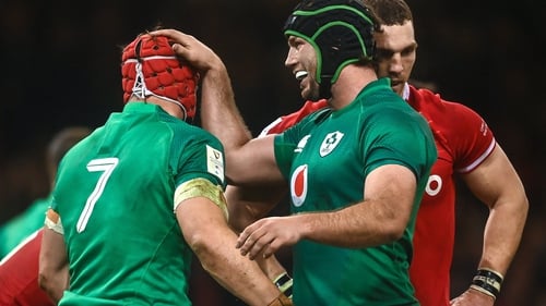 Caelan Doris congratulates Josh van der Flier (left) after he scored Ireland's fourth try against Wales