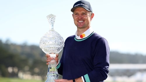 Justin Rose with the winner's trophy at Pebble Beach