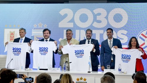 T-shirts that read in Spanish '2030 together' were held up as the bid from the four countries was formalised