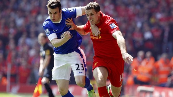 Seamus Coleman and Jordan Henderson battle for possession during the Merseyside derby in May 2013