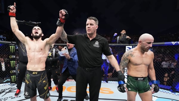Islam Makhachev (L) reacts to being crowned the victor