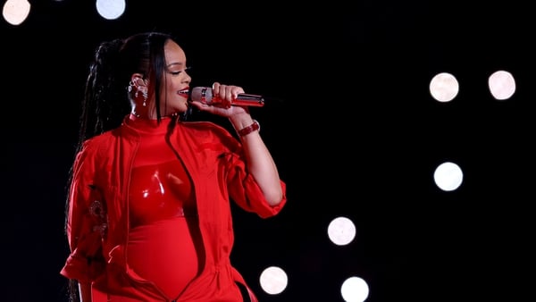Rihanna wore a red breastplate from Loewe for her half time show performance. Getty Images
