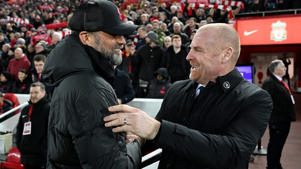 Liverpool manager Jurgen Klopp (L) greets Everton boss Sean Dyche
