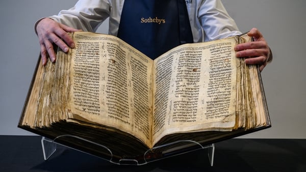 The 'Codex Sassoon' bible is displayed at Sotheby's in New York