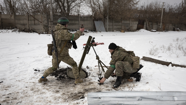 Ukrainian soldiers fire mortars in the battle for Bakhmut