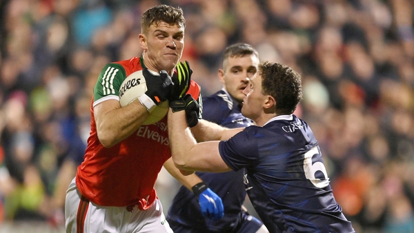 Mayo's Jordan Flynn is tackled by Kerry centre-back Tadhg Morley
