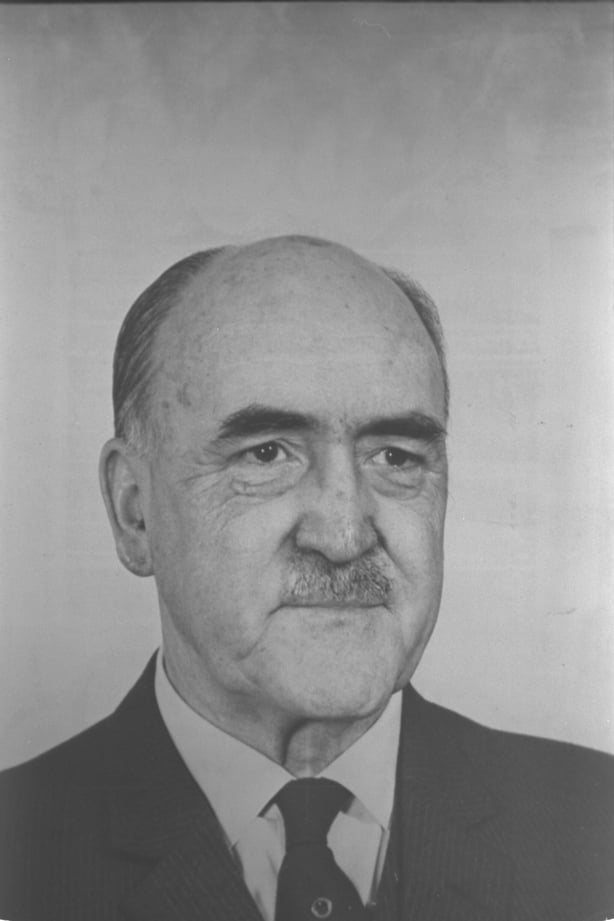 Black and photo of Frank Aiken, a white man in his 60s with a moustache
