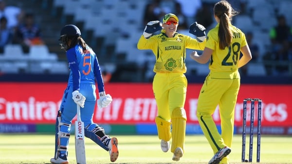 Darcie Brown of Australia celebrates the wicket of Jemimah Rodrigues of India with team mate Alyssa Healy